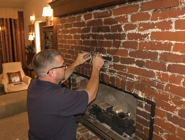 Wildomar Chimney Sweep expert fixing a fireplace in Wildomar, CA